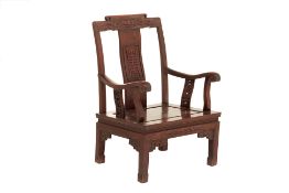 A CHINESE ROSEWOOD ARMCHAIR