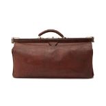 A LARGE VINTAGE BROWN LEATHER GLADSTONE BAG