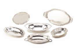 A GROUP OF OVAL SILVER PLATED DISHES AND TRAYS