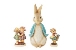 TWO GOEBEL PORCELAIN GROUPS AND A MODEL OF PETER RABBIT