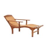 AN INDO-DUTCH TEAK PLANTATION RECLINING CHAIR