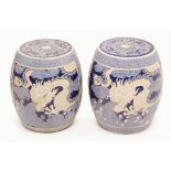A PAIR OF BLUE AND WHITE BARREL FORM STOOLS