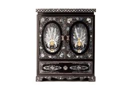 A MOTHER OF PEARL INLAID BLACK LACQUER JEWELLERY BOX