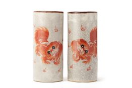 A PAIR OF IRON RED DECORATED CYLINDER VASES