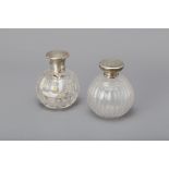 TWO SILVER MOUNTED CUT GLASS SPHERICAL SCENT BOTTLES