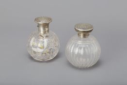 TWO SILVER MOUNTED CUT GLASS SPHERICAL SCENT BOTTLES