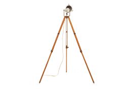 AN INDUSTRIAL TRIPOD FLOOR LAMP