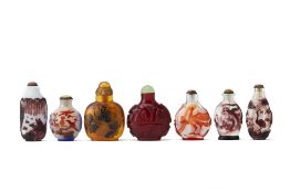 A GROUP OF SEVEN CHINESE GLASS SNUFF BOTTLES