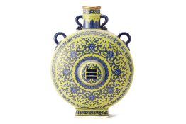 A YELLOW GROUND PORCELAIN MOONFLASK
