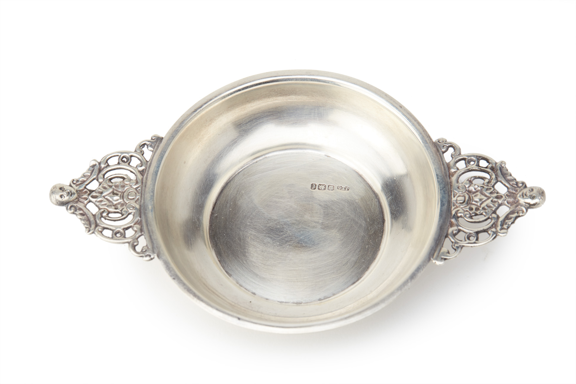 A LATE VICTORIAN ENGLISH SILVER QUAICH SHAPED BOWL