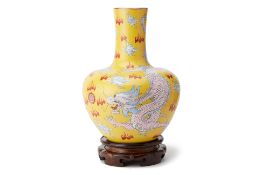 A LARGE YELLOW GROUND DRAGON BOTTLE VASE