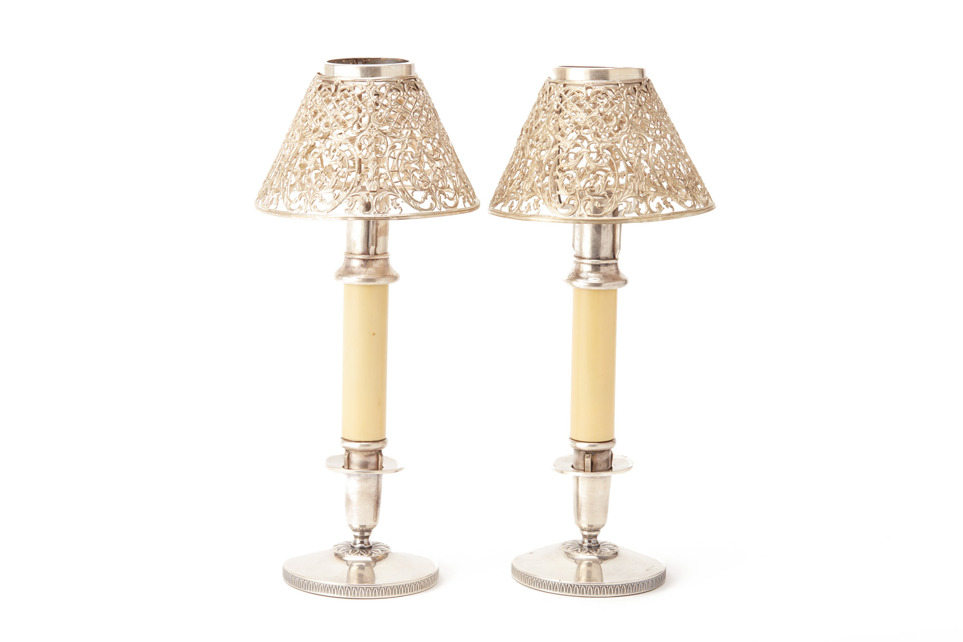 A PAIR OF SWEDISH SILVER CANDLESTICKS AND ASSOCIATED SHADES