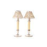 A PAIR OF SWEDISH SILVER CANDLESTICKS AND ASSOCIATED SHADES