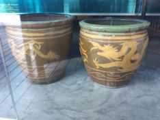 TWO LARGE VINTAGE POTTERY DRAGON POTS