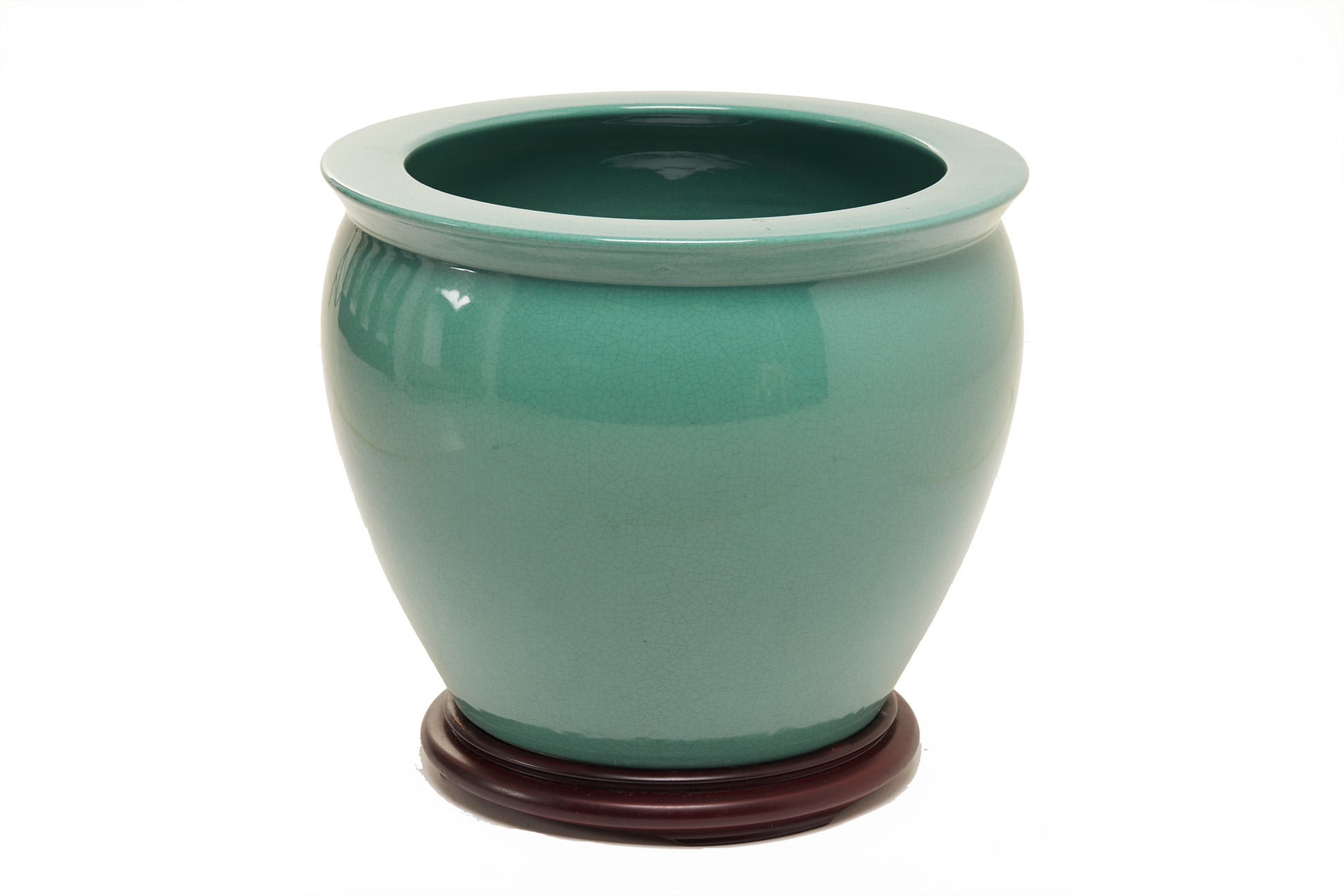 A LARGE GREEN GLAZED JARDINERE