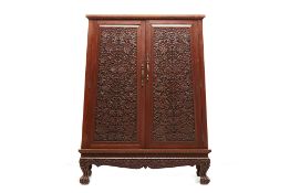 A THAI CARVED TEAK SIDE CABINET