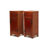 A PAIR OF ELM AND RATTAN SIDE CABINETS