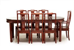 A MOTHER OF PEARL INLAID DINING TABLE AND EIGHT CHAIRS