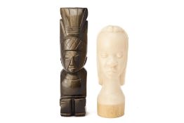 AN ONYX CARVING AND AN AFRICAN CARVED IVORY HEAD