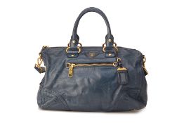 A PRADA TEAL LEATHER HANDBAG