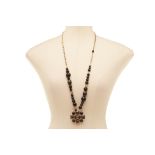 A CHANEL BLACK BEAD NECKLACE