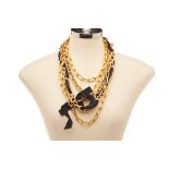 A GOLD TONE MULTI-CHAIN NECKLACE