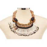 A BROWN FEATHER NECKLACE
