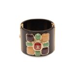 A CHANEL BLACK CUFF WITH MULTICOLOUR STONE FLOWER