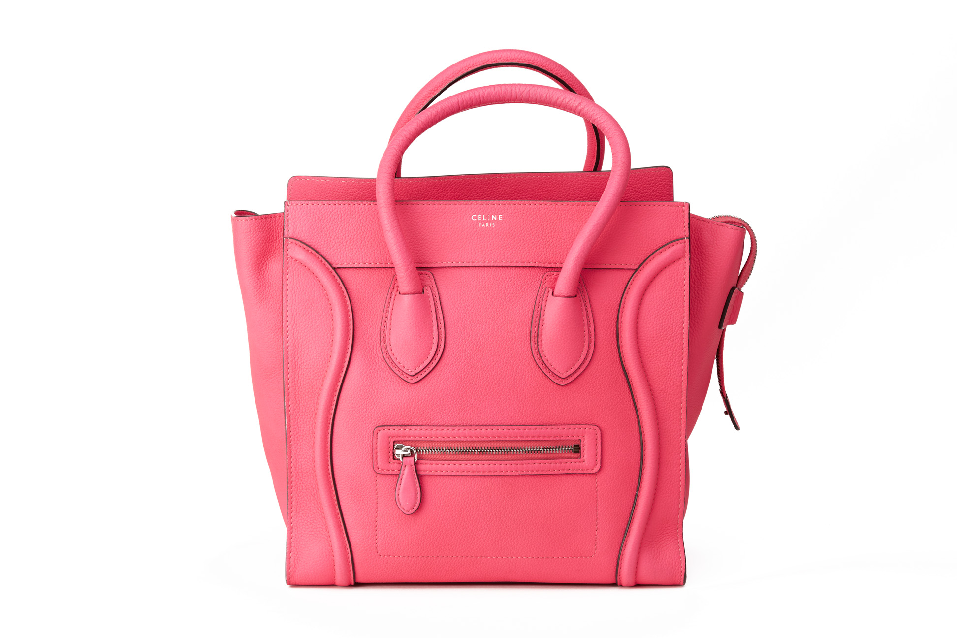 A CELINE 'MINI LUGGAGE' NEON PINK HANDBAG