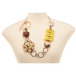 A YELLOW & TORTOISE FLOWER NECKLACE