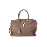 A YVES SAINT LAURENT GREY LEATHER HANDBAG