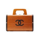 A CHANEL LIMITED EDITION WOOD CRUISE TRUNK BAG