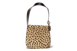 A CHRISTIAN DIOR QUILTED CHEETAH PRINT CANVAS HANDBAG