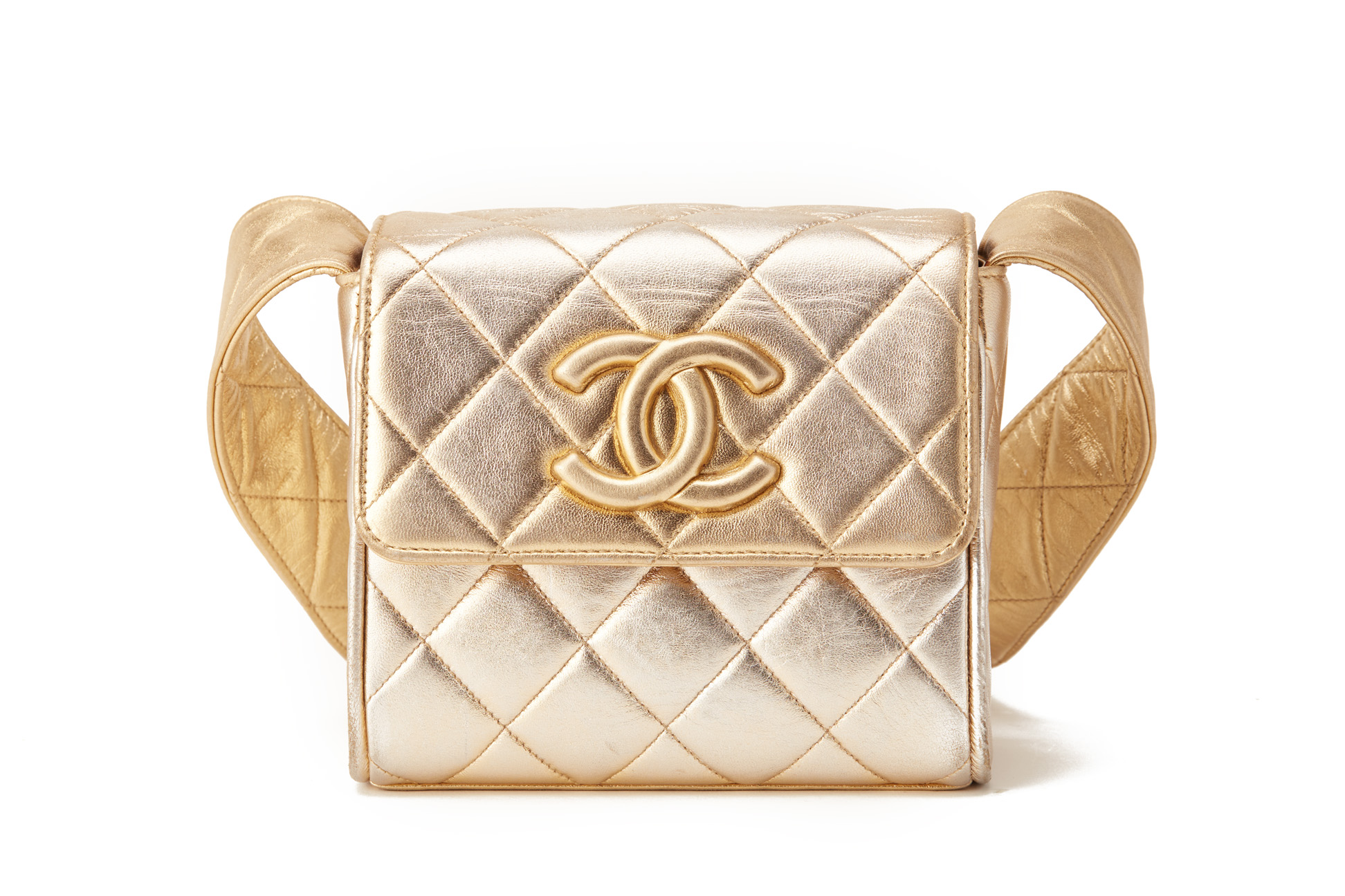 A CHANEL SMALL GOLD QUILTED FLAP CROSS-BODY BAG