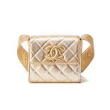A CHANEL SMALL GOLD QUILTED FLAP CROSS-BODY BAG