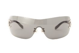 A PAIR OF CHANEL BLACK RIMLESS SUNGLASSES