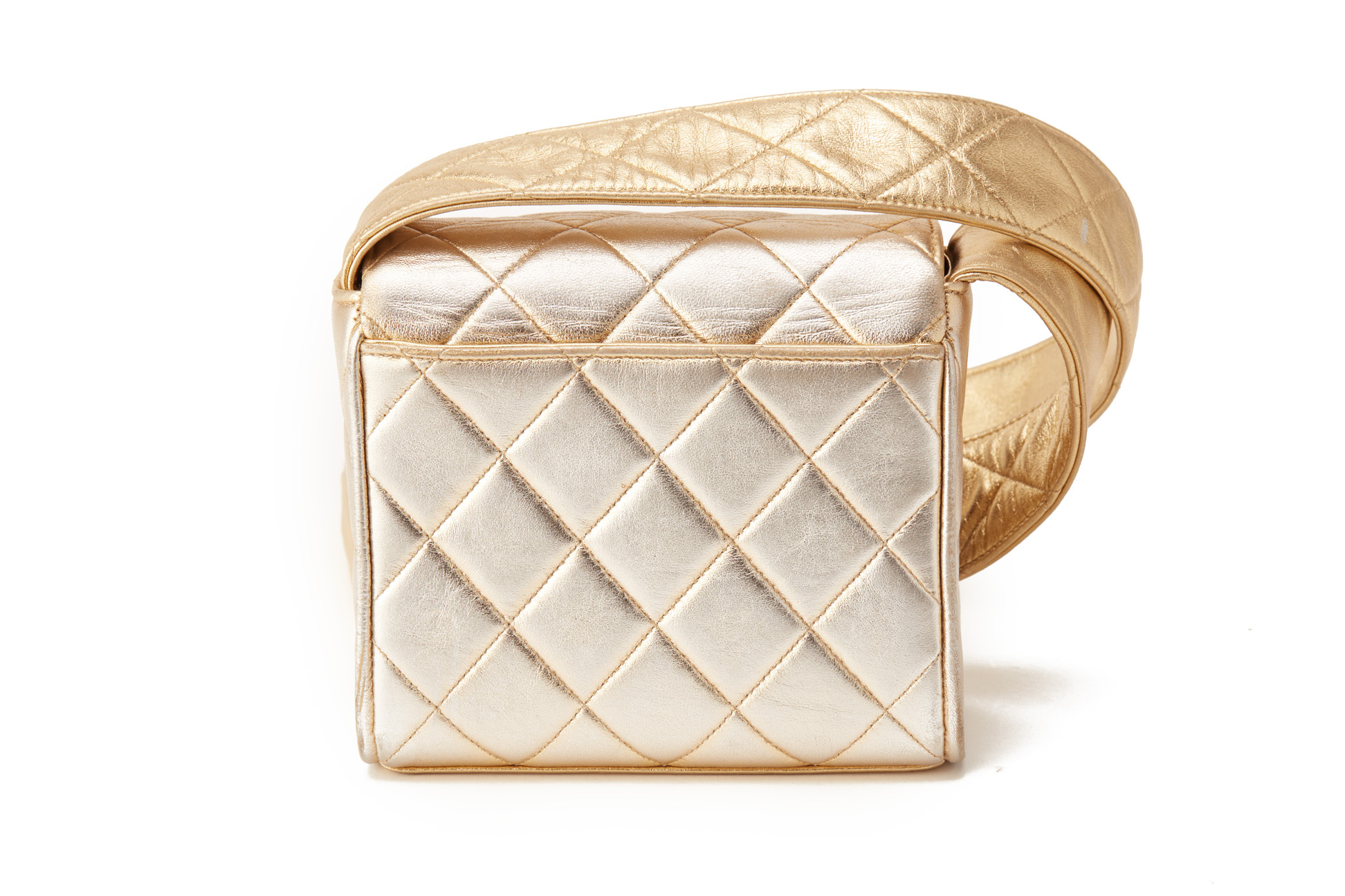 A CHANEL SMALL GOLD QUILTED FLAP CROSS-BODY BAG - Image 3 of 4