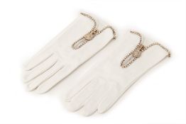 A PAIR OF VERSACE WHITE LEATHER GLOVES