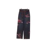 A PAIR OF GUCCI FLORAL EMBROIDERED DARK WASH JEANS