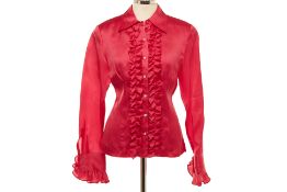 A FUCHSIA PINK SILK RUFFLE BLOUSE