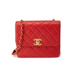 A VINTAGE CHANEL QUILTED RED LAMBSKIN FLAP BAG