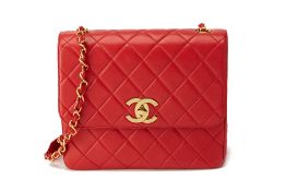 A VINTAGE CHANEL QUILTED RED LAMBSKIN FLAP BAG