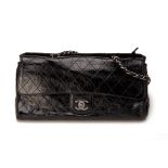 A CHANEL QUILTED BLACK PATENT RITZ FLAP BAG