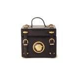 A GIANNI VERSACE BLACK LEATHER VANITY CASE