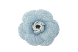 A CHANEL 'CAMELLIA' BLUE DENIM FLOWER BROOCH