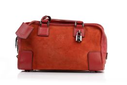 A LOEWE RED SUEDE HANDBAG