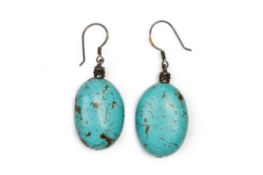 A PAIR OF SILVER AND TURQUOISE EARRINGS