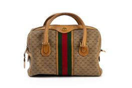 A GUCCI OPHIDIA MONOGRAM CANVAS BOWLING BAG