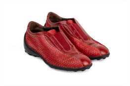 A PAIR OF TOD'S RED SNAKESKIN SHOES