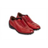 A PAIR OF TOD'S RED SNAKESKIN SHOES